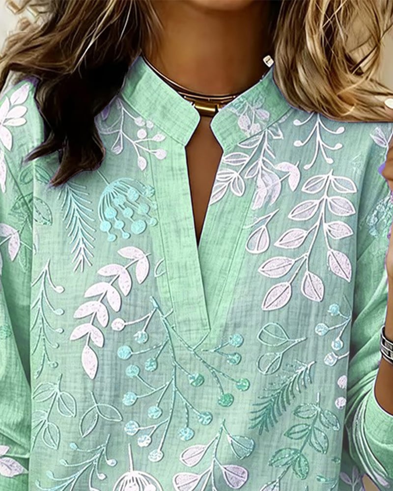 FloraMuse – Elegante Blumenbluse mit Stehkragen