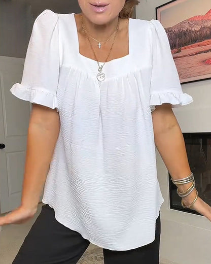 VibeLuxe – Camisa elegante con mangas de volantes
