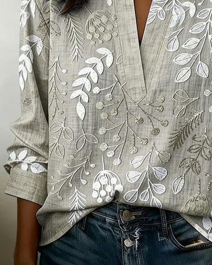 FloraMuse – Elegante Blumenbluse mit Stehkragen