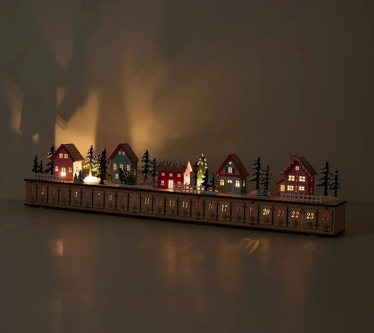 ChristmasGlow - Calendario de Adviento Pueblo Navideño