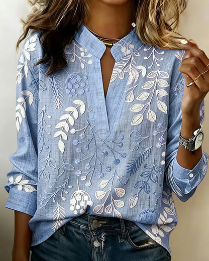 FloraMuse – Elegante Blumenbluse mit Stehkragen