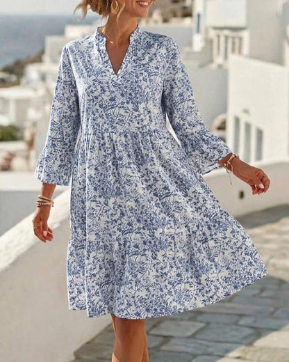 BloomLayer – Vestido floral de capas con cuello en V