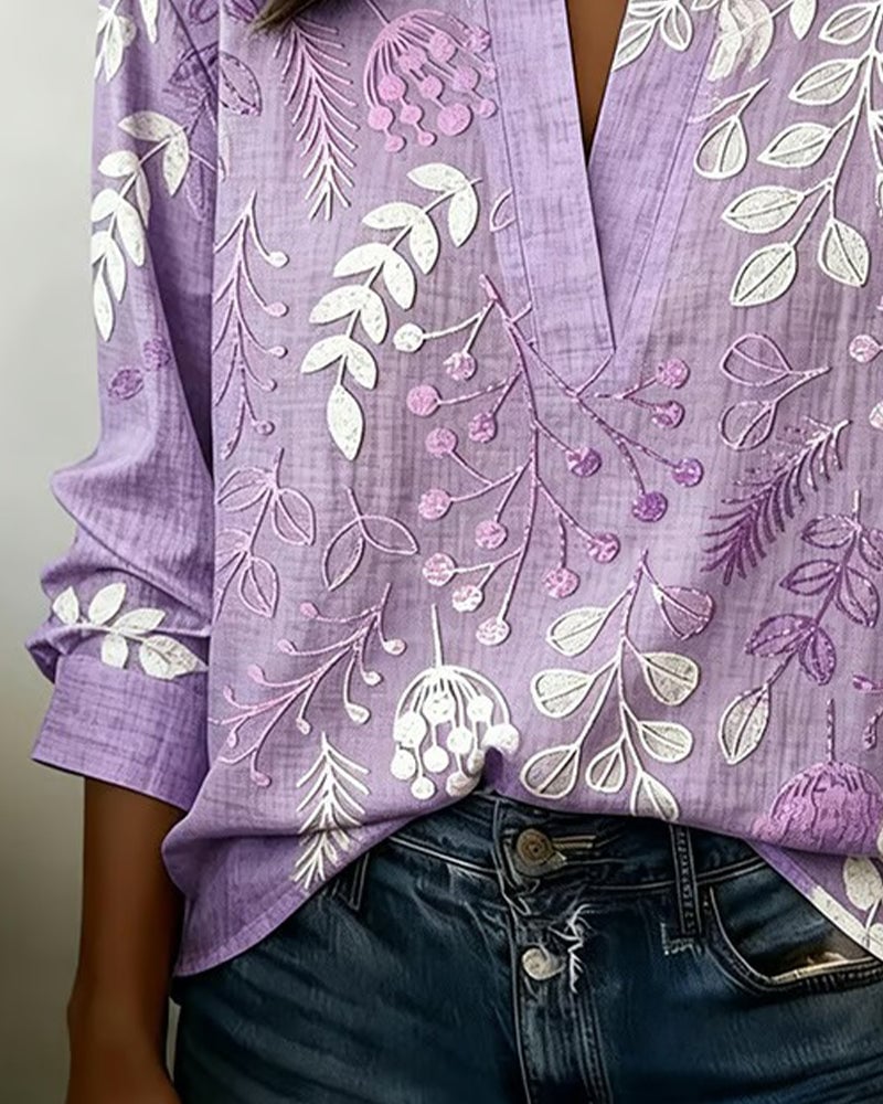 FloraMuse – Elegante Blumenbluse mit Stehkragen