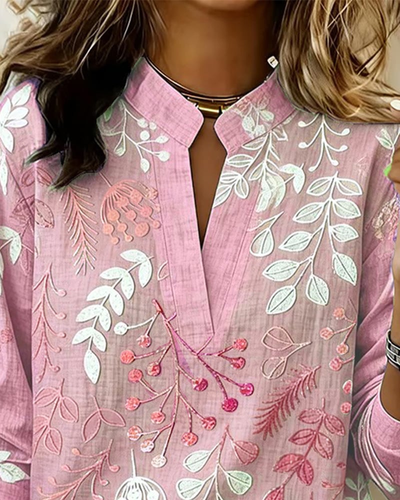 FloraMuse – Elegante Blumenbluse mit Stehkragen