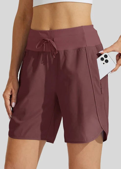 AthletiQ – Pantalones cortos de running de tiro alto para mujer