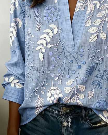 FloraMuse – Elegante Blumenbluse mit Stehkragen