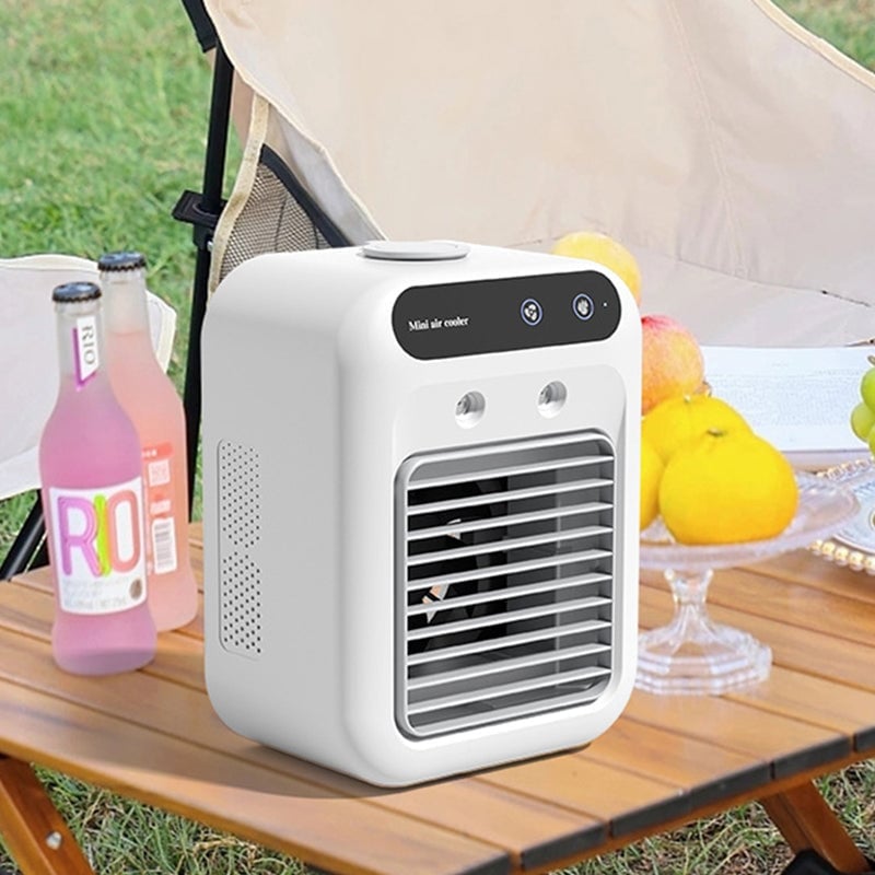 BreezeMist – Mini Ventilador Rociador Refrigerante