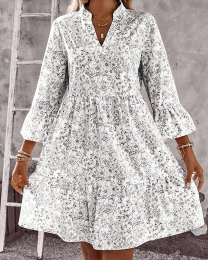 BloomLayer – Vestido floral de capas con cuello en V