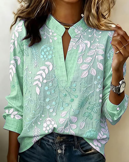 FloraMuse – Elegante Blumenbluse mit Stehkragen