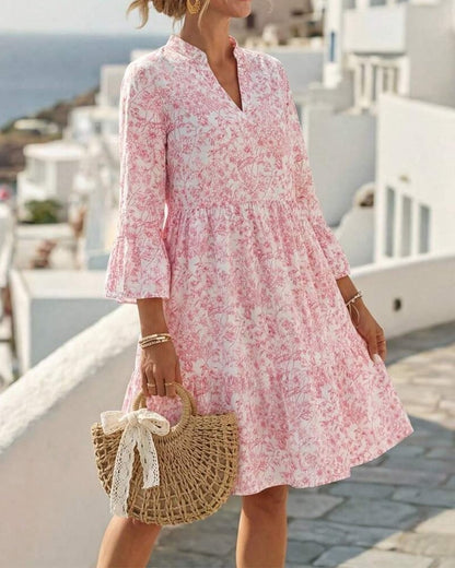BloomLayer – Vestido floral de capas con cuello en V