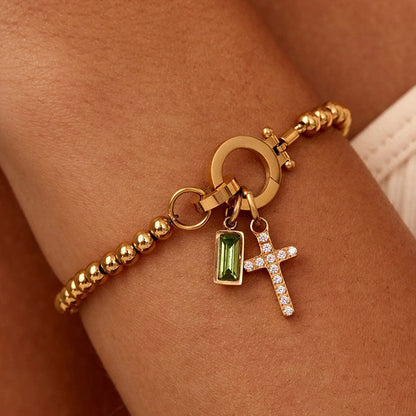 CelestiaFaith – Pulsera con cruz dorada