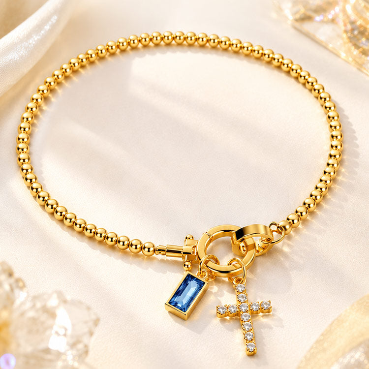 CelestiaFaith – Pulsera con cruz dorada