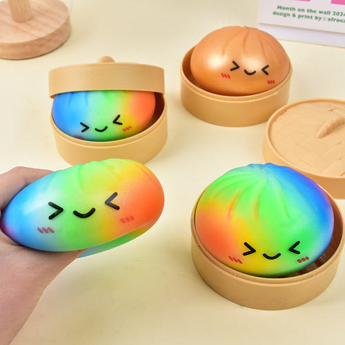 SquishJoy – Juguete Blando Súper Raro de Arcoíris con Forma de Dumpling Sonriente