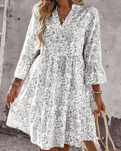 BloomLayer – Vestido floral de capas con cuello en V