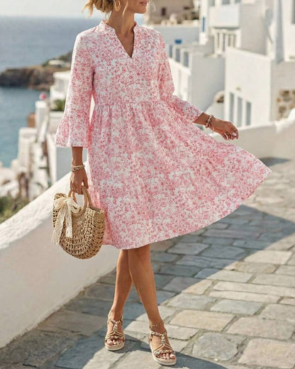 BloomLayer – Vestido floral de capas con cuello en V