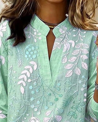 FloraMuse – Elegante Blumenbluse mit Stehkragen