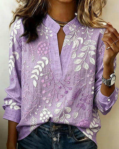 FloraMuse – Elegante Blumenbluse mit Stehkragen