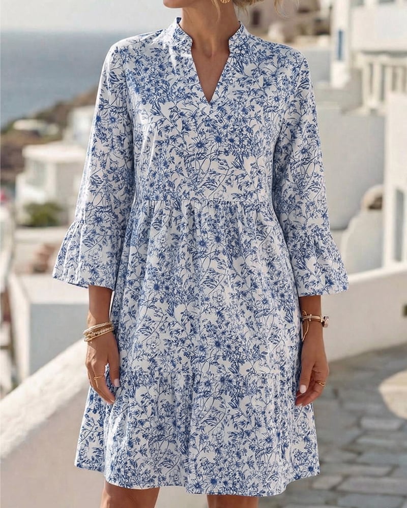 BloomLayer – Vestido floral de capas con cuello en V