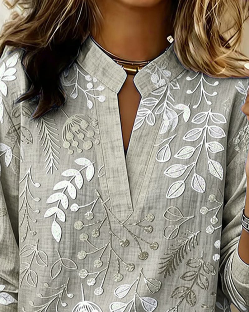 FloraMuse – Elegante Blumenbluse mit Stehkragen