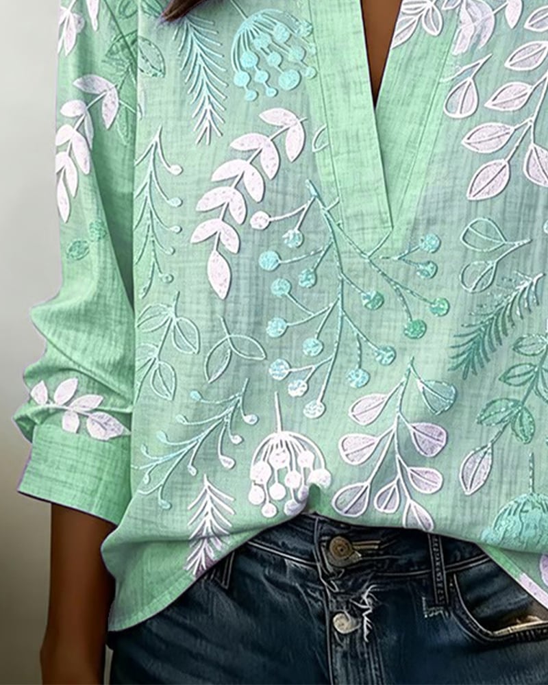FloraMuse – Elegante Blumenbluse mit Stehkragen