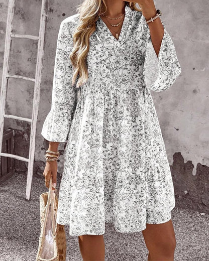 BloomLayer – Vestido floral de capas con cuello en V