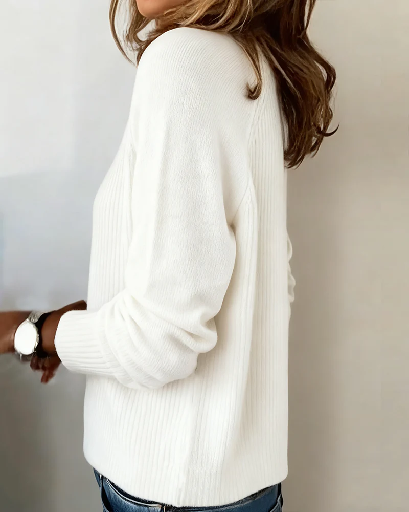 RaglaMode – Suéter elegante con mangas abotonadas