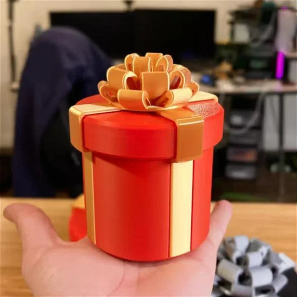 GiftQuest – Weihnachtliche Geschenkschachtel im Matroschka-Stil
