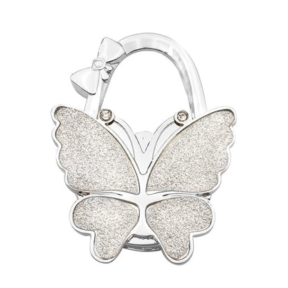 ButterHold – Faltbarer Taschenhalter in Schmetterlingsform