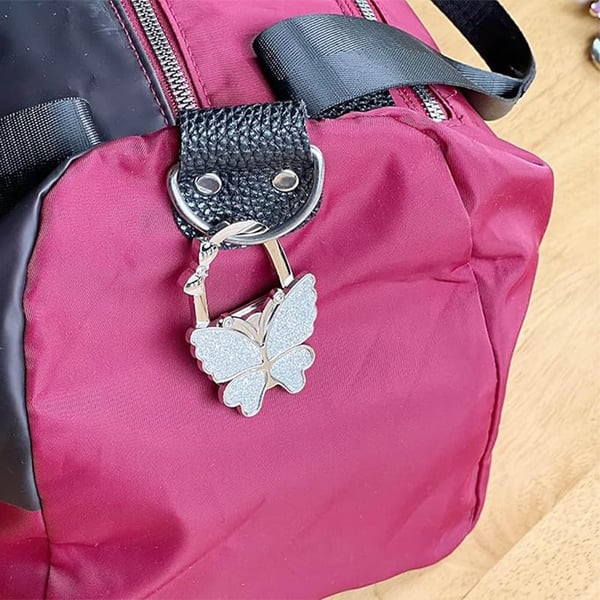 ButterHold – Faltbarer Taschenhalter in Schmetterlingsform