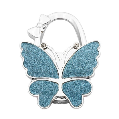 ButterHold – Faltbarer Taschenhalter in Schmetterlingsform